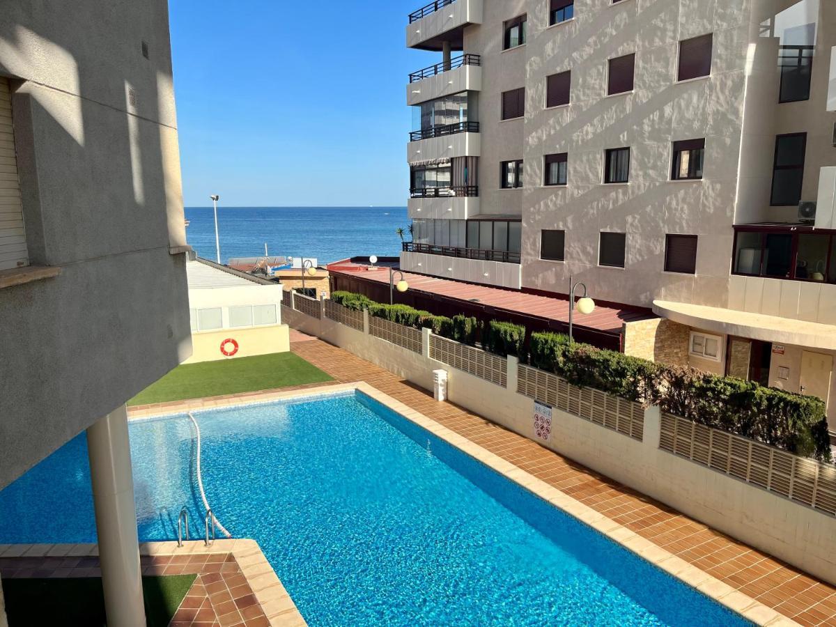 Apartamento con parking y piscina frente al mar para 4 personas Calpe Exterior foto